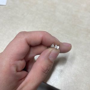 Small pear shaped diamond studs in 14k white gold